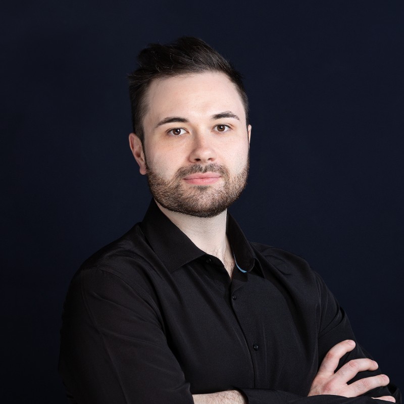 This image has an empty alt attribute; its file name is adam.jpg