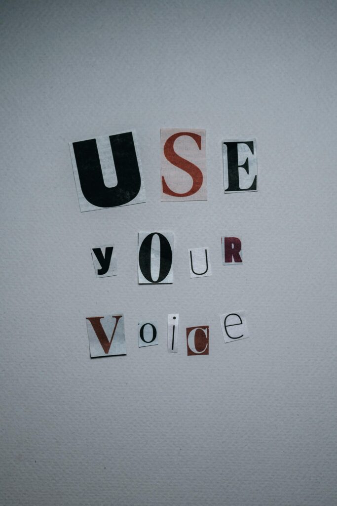 Photo by Polina ⠀: https://www.pexels.com/photo/use-your-voice-inscription-on-gray-background-6185245/