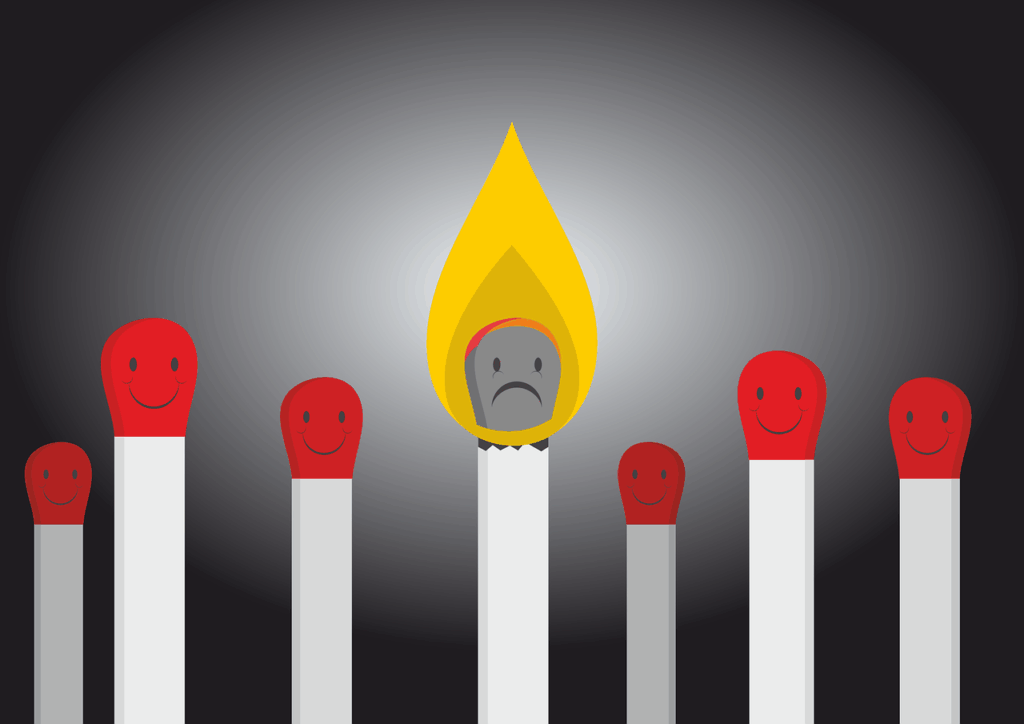 An image of cartoon seven matches. One match in the middle is lit with a sad face while the rest are unlit and looking happy. The image is intended to represent burnout.