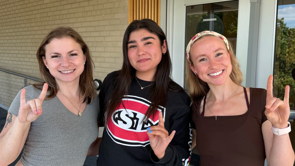 three women smiling